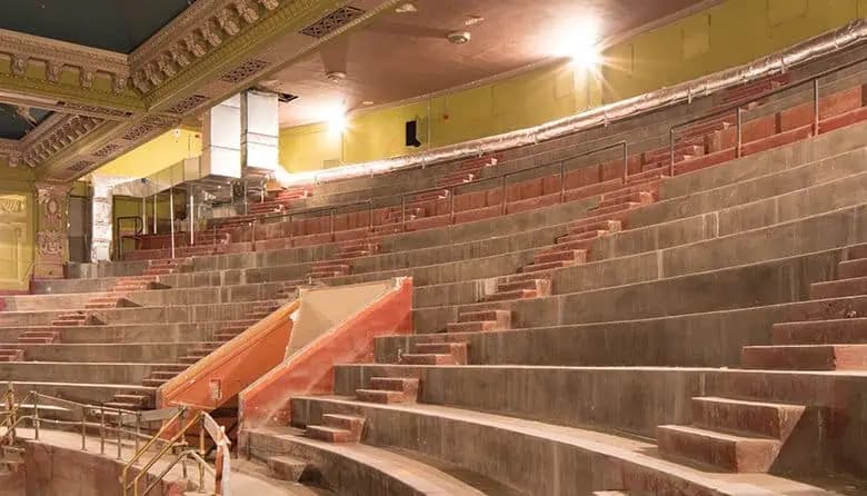 The hidden upper balcony of the Coliseum Theatre, today, with HVAC equipment from its retail decades